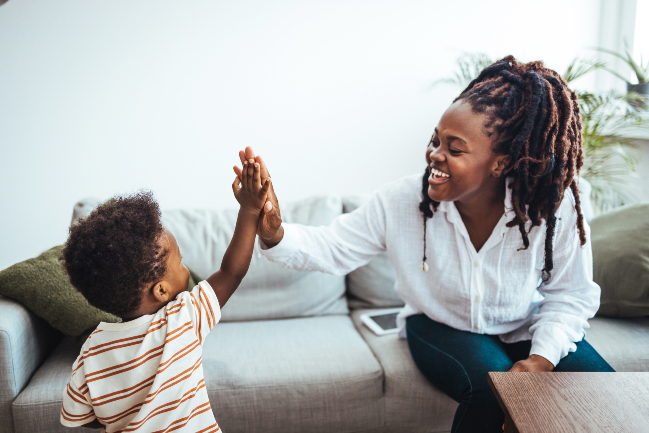 mother and son on couch