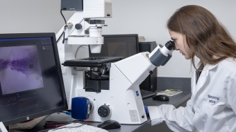 scientist studying breast cancer