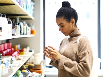 Black woman shopping for personal care products